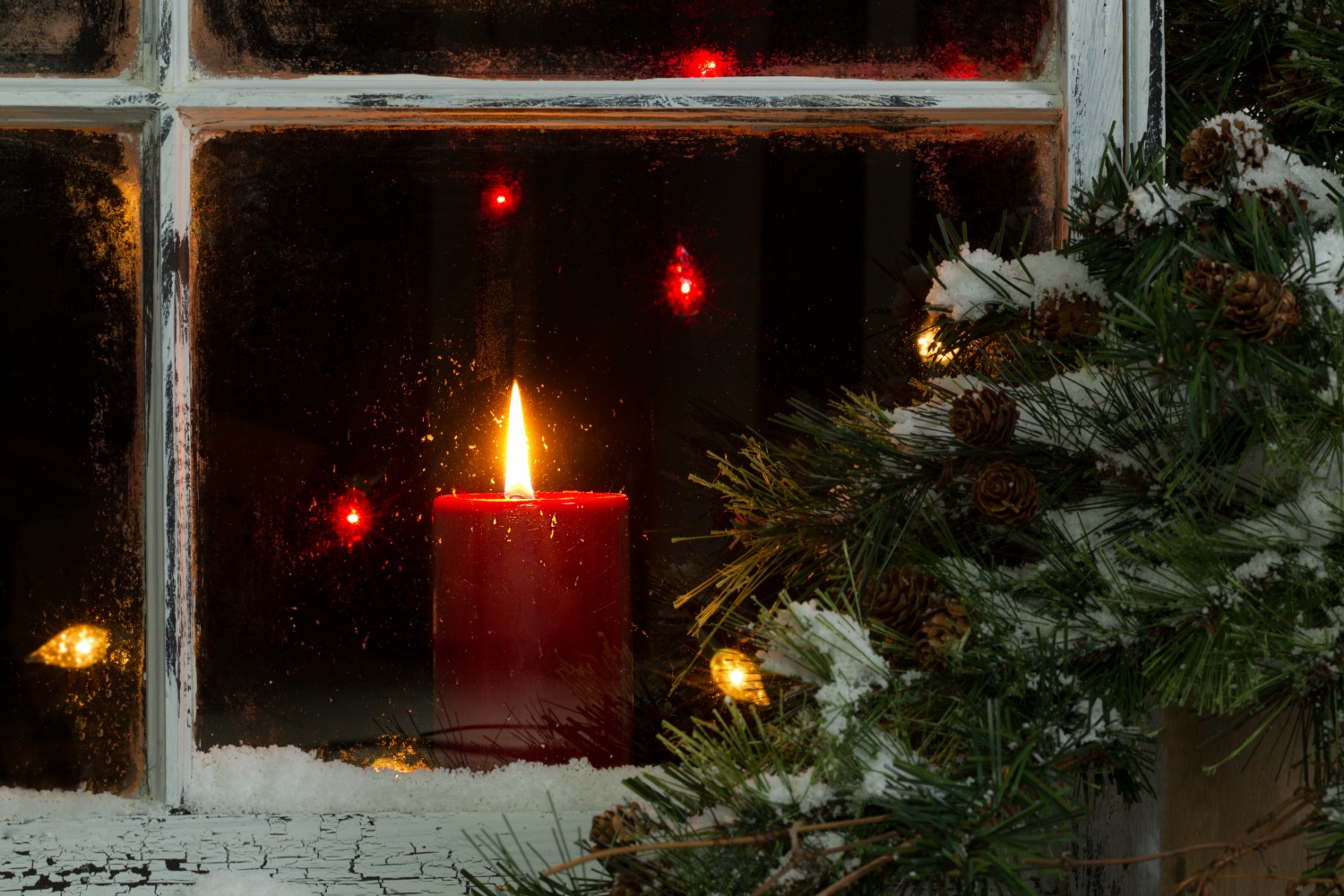 christmas candle in window